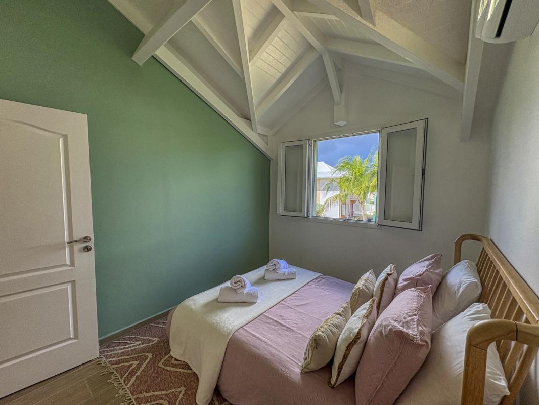 28.Location villa pied dans l'eau Saint François Guadeloupe_Chambre 1 Etage